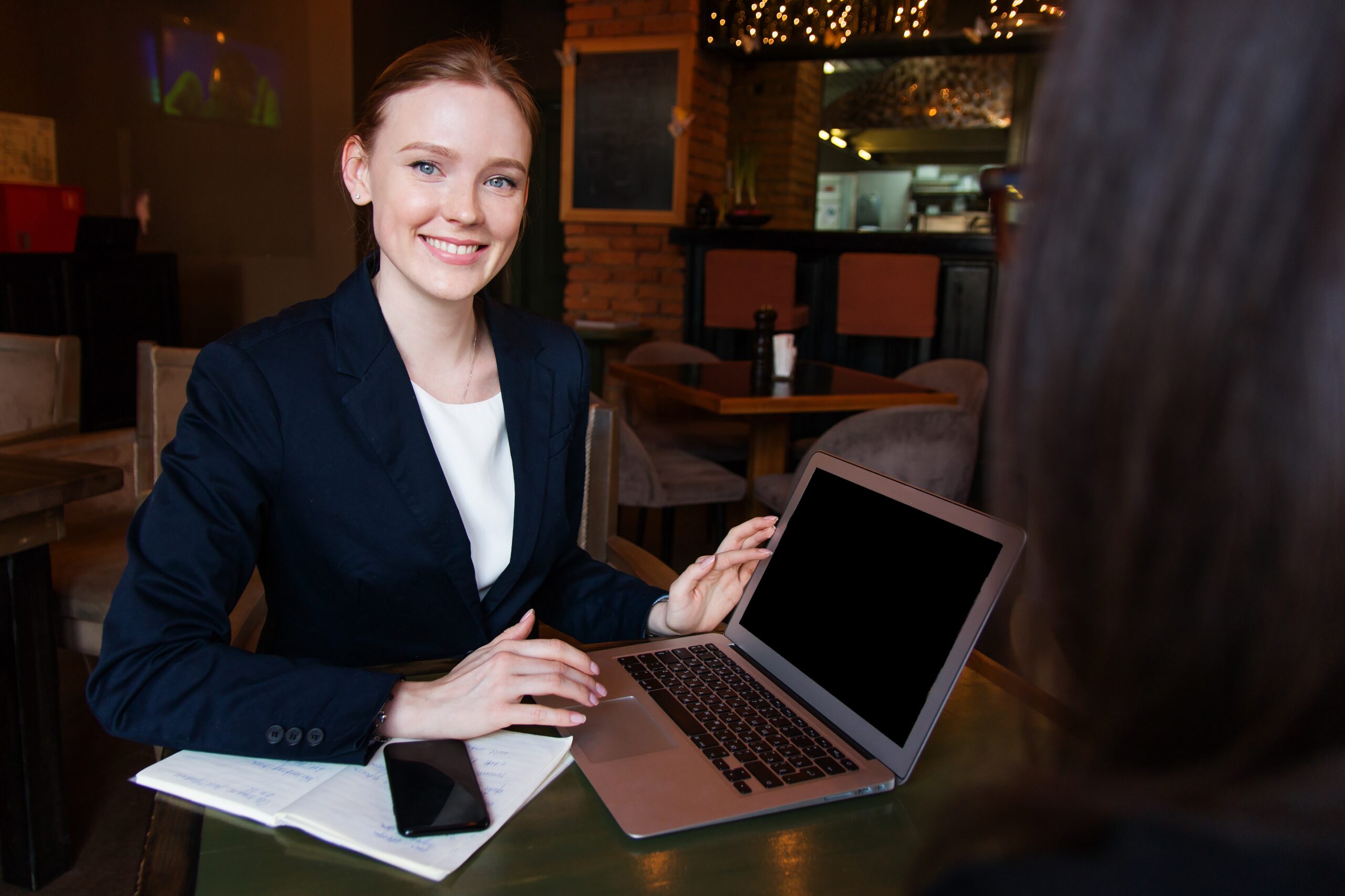 smiling woman at laptop